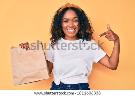 Similar – Image, Stock Photo Person with paper bag on head pointing at camera