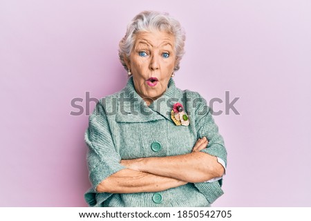 Similar – Image, Stock Photo Portrait of an old woman doing some gardening while smiling to camera during free time. Leisure time activities at home. Saving the planet plating plants. Planet concerns. Mature people works at home