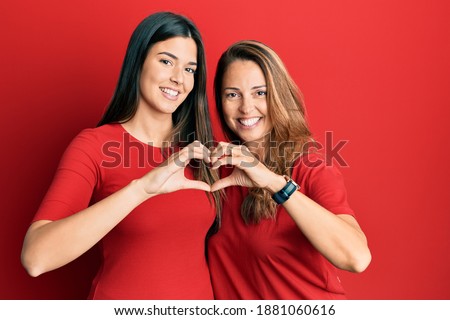 Similar – Image, Stock Photo woman with red heart shaped cardboard in her eyes smiling.