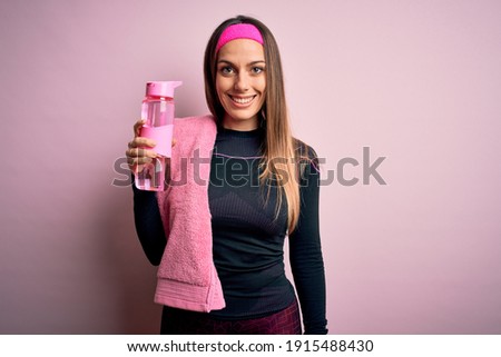 Similar – Image, Stock Photo Content sportswoman with water bottle taking selfie on smartphone