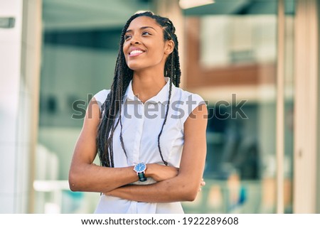 Similar – Foto Bild Moderne schwarze Frau mit Computer im Sessel