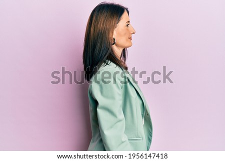Similar – Image, Stock Photo Side portrait of a young woman with freckles and dimples smiling looking over her shoulder