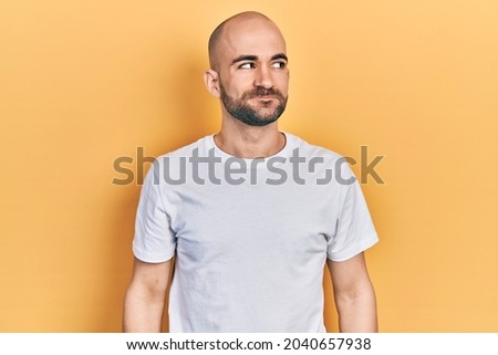 Similar – Image, Stock Photo Bald cool man in pedestrian bridge portrait