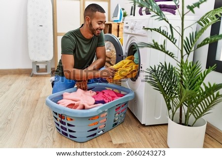 Similar – Foto Bild Bärtiger Mann benutzt Waschmaschine zu Hause