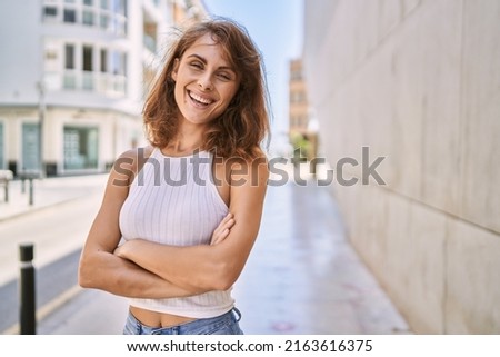 Young caucasian woman smiling confident at street Foto stock © 