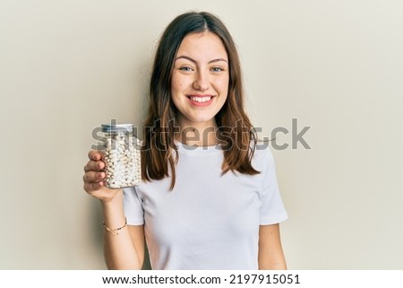 Similar – Image, Stock Photo Happy woman with bottle of beer in tent