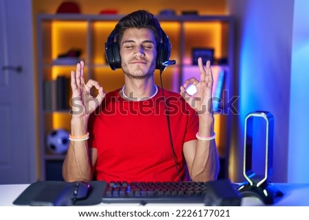 Similar – Image, Stock Photo Young hispanic men doing acrobatics near to a pink wall on the street