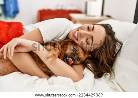 Similar – Image, Stock Photo Adult tired dog lying on sofa at home