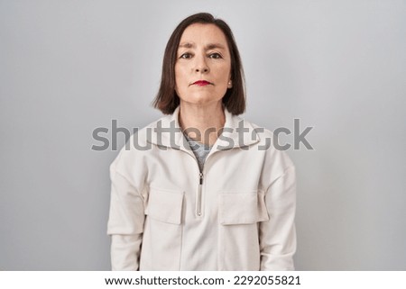 Similar – Image, Stock Photo Serious woman looking at camera