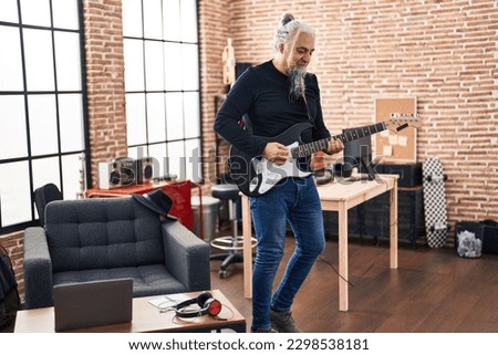 Similar – Image, Stock Photo Guitars in stand in side light