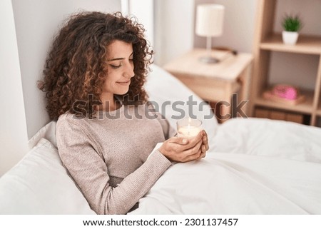 Image, Stock Photo Woman holding a candle at night, during the Easter celebrations