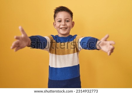 Similar – Image, Stock Photo Happy Latin boy with Down syndrome dancing at home