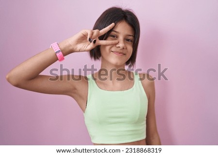 Similar – Image, Stock Photo Portrait of teenager girl looking at the camera.