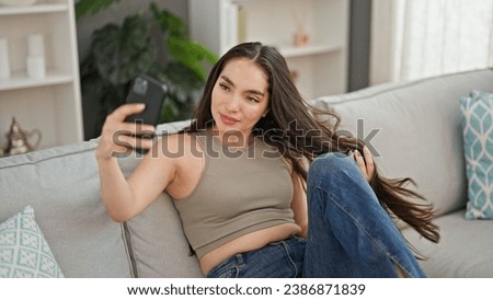 Similar – Image, Stock Photo Happy adult woman taking selfie on top of mountain