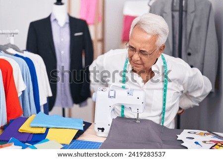 Similar – Image, Stock Photo Person sewing the spine of a book