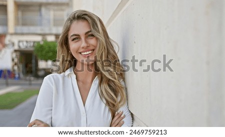 Image, Stock Photo young blonde woman leaning sadly against a wall