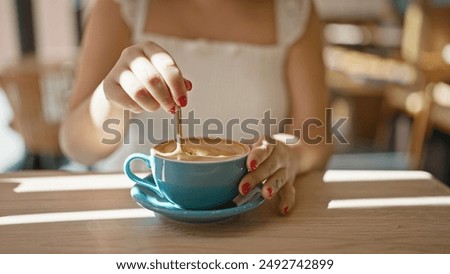 Similar – Image, Stock Photo Woman drinking a cup of coffee and using mobile