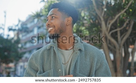 Similar – Image, Stock Photo Content trendy African American woman on wall