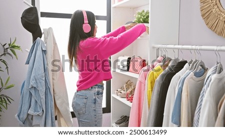 Similar – Image, Stock Photo Woman in colorful clothes with a cardboard box on her head