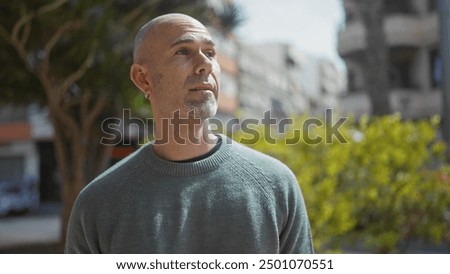 Similar – Image, Stock Photo Bald cool man in pedestrian bridge portrait