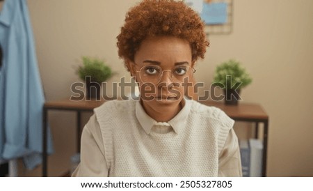 Similar – Image, Stock Photo Focused stylish black woman applying eyeliner at home