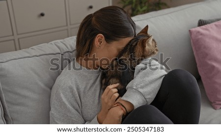 Similar – Foto Bild Junge Frau krault ihre Siamkatze auf dem Boden liegend