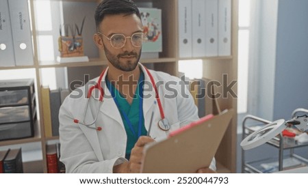 Similar – Image, Stock Photo young veterinarian man reading documents about illness of a cute small dog.on white background. Indoors