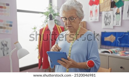 Similar – Image, Stock Photo Senior craftswoman with tablet computer in art studio