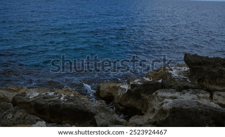 Similar – Foto Bild Felsige Küste unter blauem Himmel