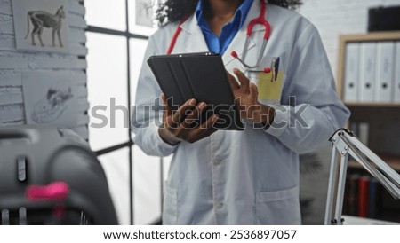 Similar – Image, Stock Photo Female veterinarian doctor uses ear drops to treat a cat