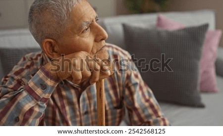 Similar – Image, Stock Photo adult man reflecting on his future