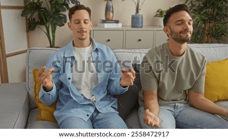 Similar – Image, Stock Photo Calm couple meditating together on mat at home