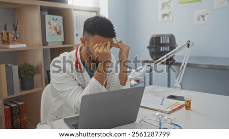 Image, Stock Photo young veterinarian man reading documents about illness of a cute small dog.on white background. Indoors