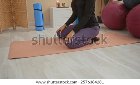 Similar – Image, Stock Photo young woman kneeling on floor feeding snacks to her cat