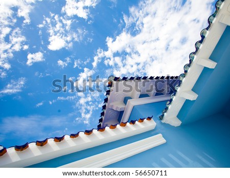 blue house against blue sky
