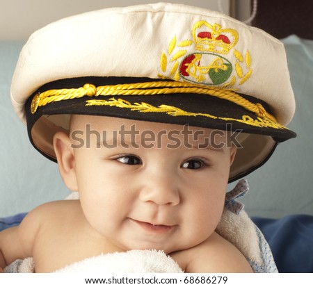 little 4 month baby happy with sailor cap