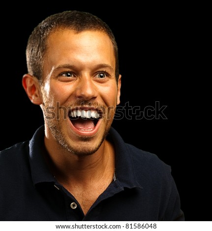 man with polo shirt on a black background