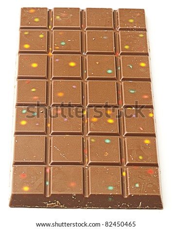 chocolate tablet with candies on a white background