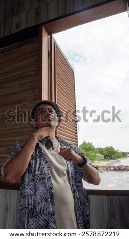 Similar – Image, Stock Photo Contemplative Asian man leaning on hand against brick building