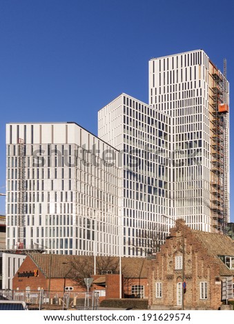 MALMO SWEDEN - MARCH 29: The new city complex MALMO LIVE, here together with old buildings, during construction in Malmo Sweden, March 29, 2014. The block will be complete the summer 2015.