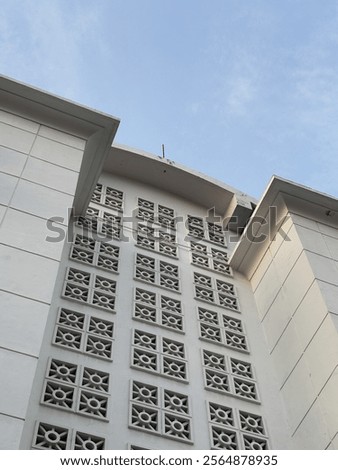 Similar – Image, Stock Photo Symmetrical facades of an old brick building