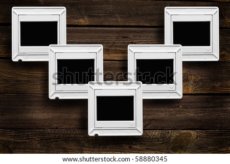 sliding seats for pictures on a wooden background