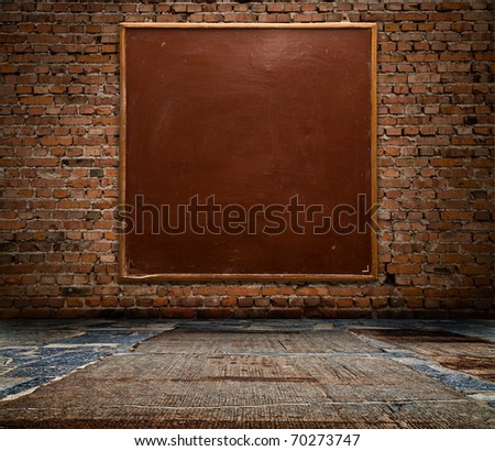 school board on a brick wall