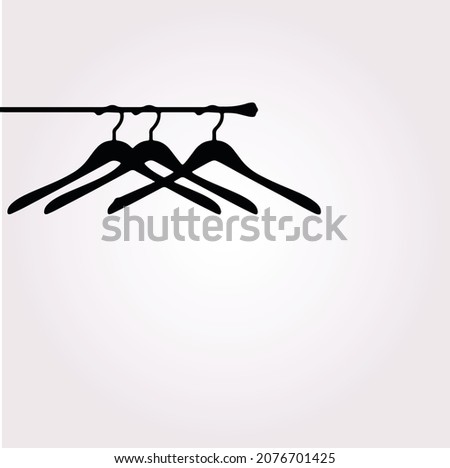 Clothes hanger silhouette. Icon vector 