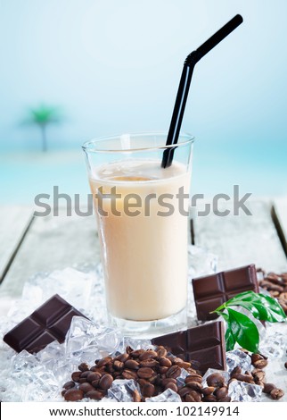 Chilled cafe mocha on ice enjoyed through a straw for a refreshing drink