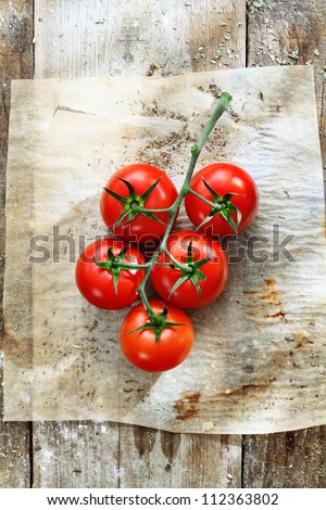 Similar – Image, Stock Photo Fresh panicles of tomatoes on a colourful plate