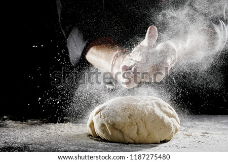 Similar – Image, Stock Photo A dough is kneaded on a kitchen table and dusted with flour