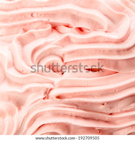 Decorative background texture of delicious creamy berry ice cream arranged in ridges swirls for a festive summer or party background