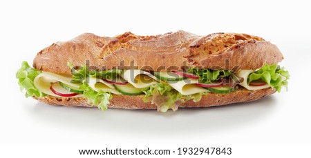 Yummy baguette sandwich with various vegetables and slices of cheese placed on white background in studio
