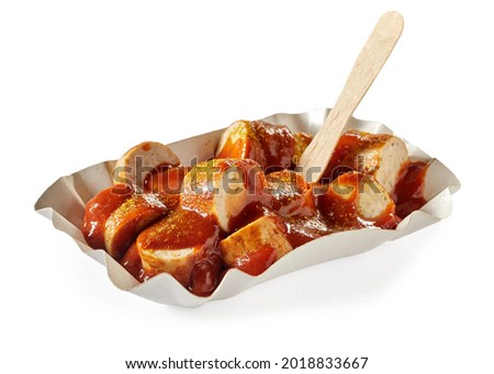 Similar – Image, Stock Photo German Currywurst sausage with curry ketchup, roasted onions and French fries with mayonnaise in the city